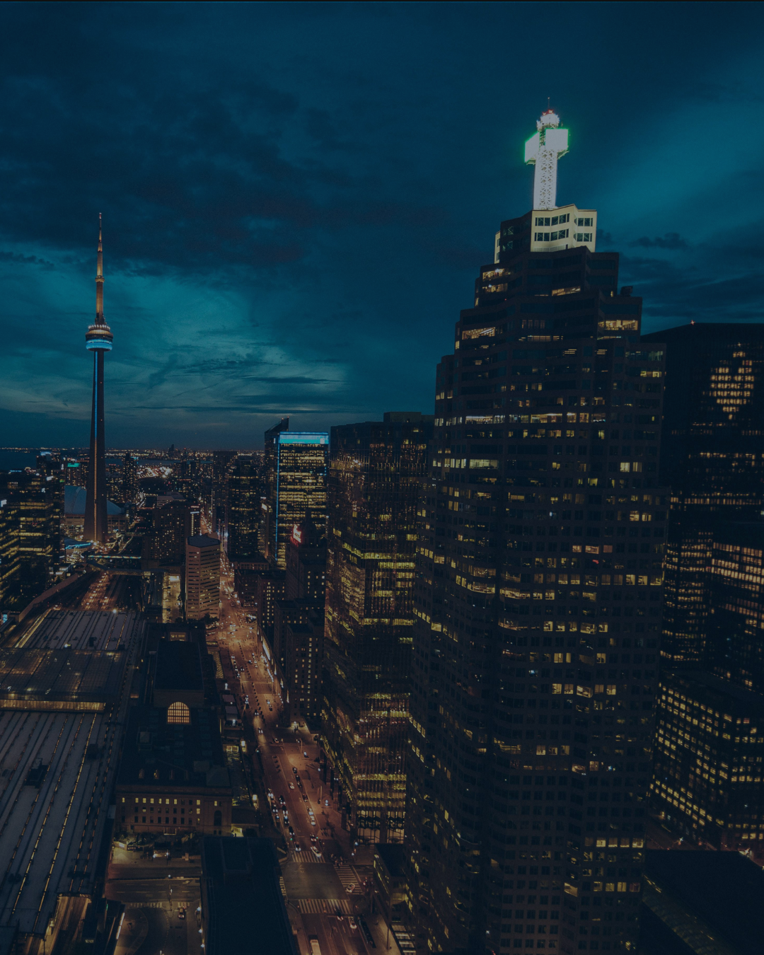Entrepreneurs running through downtown Toronto at sunrise